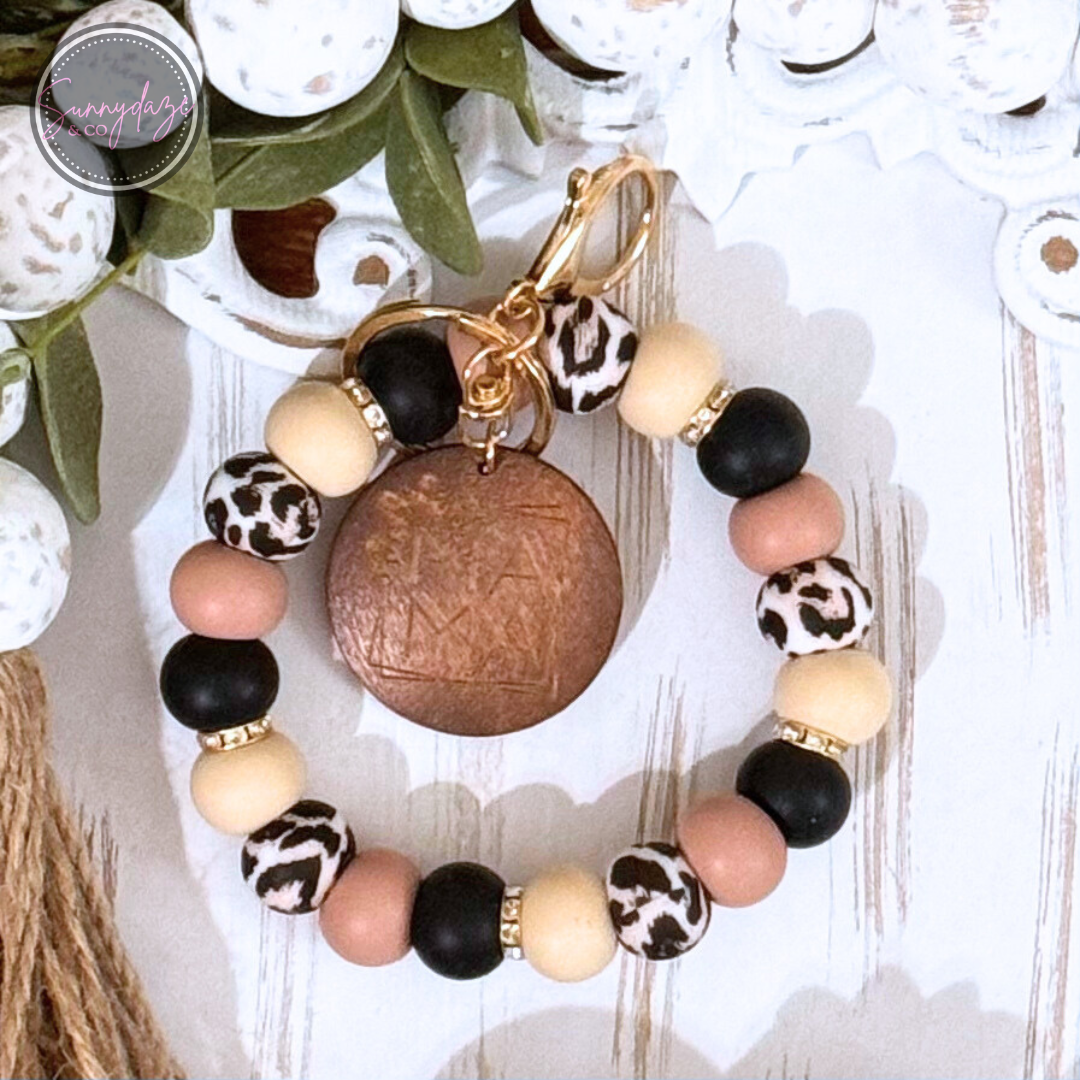 Tan Snow Leopard Mama Wristlet