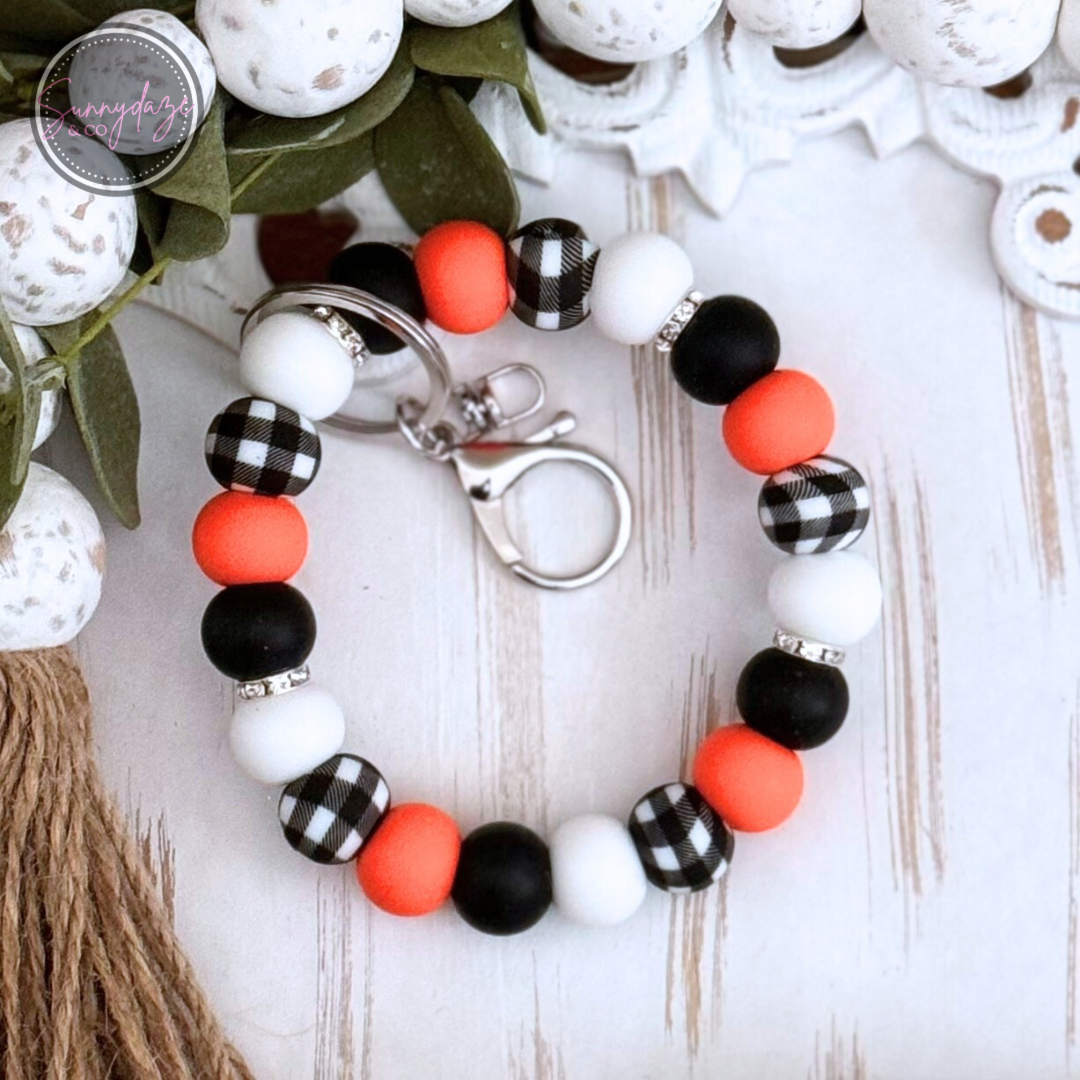 Coral Plaid Wristlet